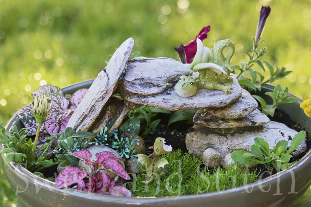 simple fairy garden with 2 dragons and cave