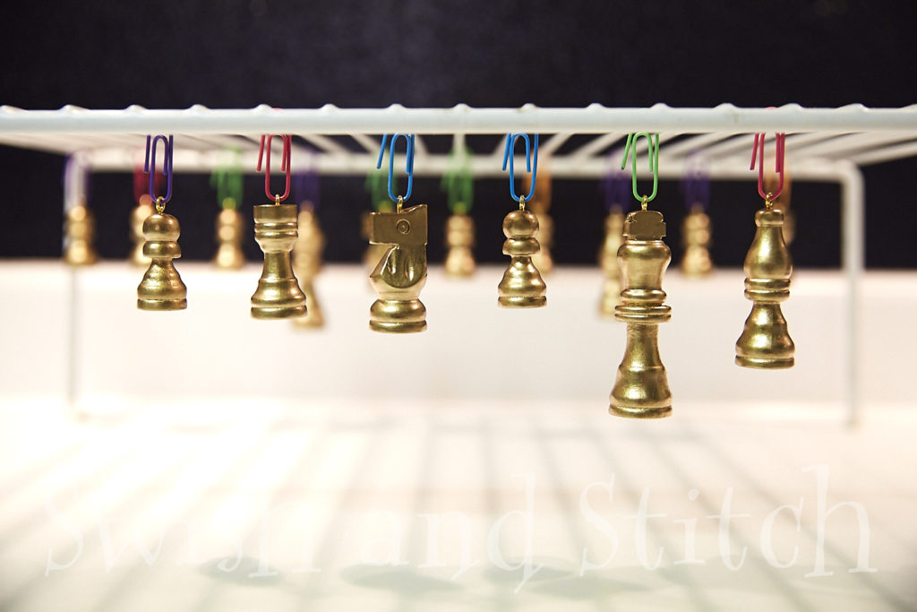 gilded chess pieces 