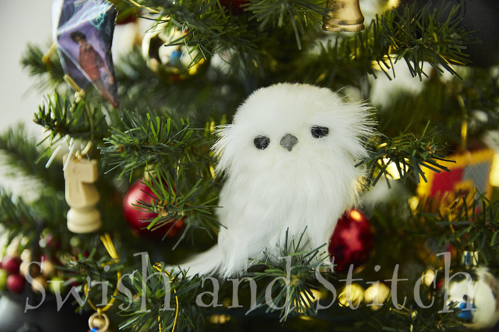 fluffy snowy owl on harry potter christmas tree