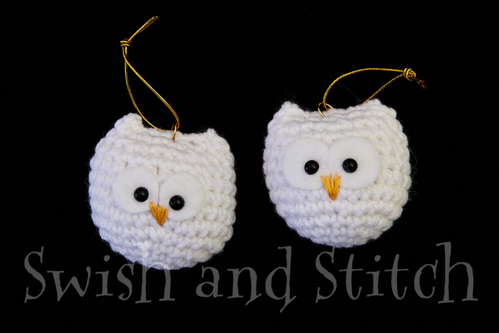 Comparing eye size on Harry Potter snowy owl ornaments