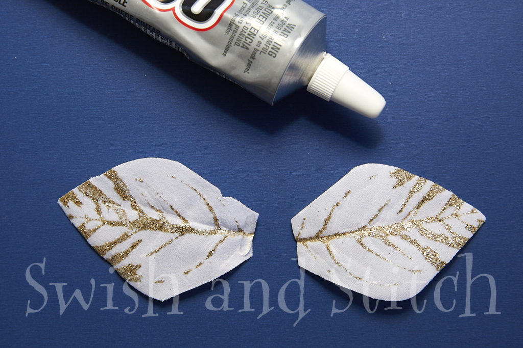 gluing the petals into wings