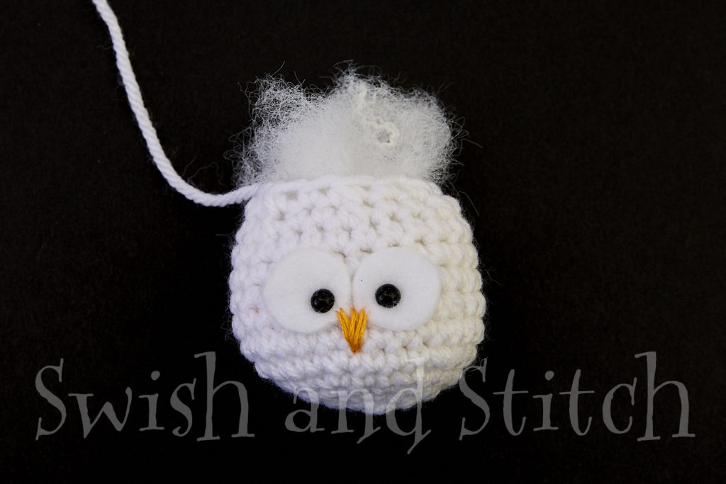 stuffing the snowy owl ornament