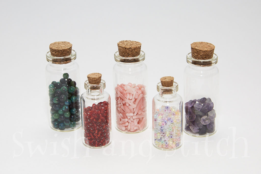 potion bottles filled with beads