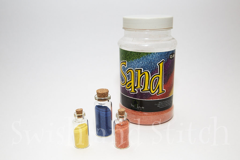 sand filled potion bottles