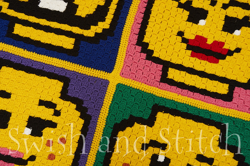 lego brick minifigure emoji faces c2c crochet afghan closeup