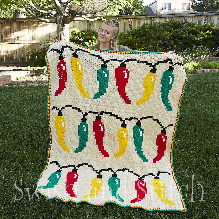 Spicy Southwestern Chile Peppers Christmas Lights C2C Crochet Afghan outside