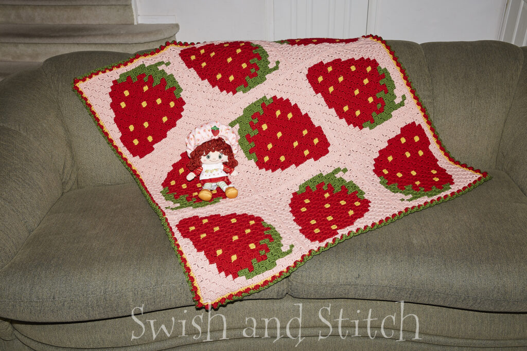 Strawberry Fields Afghan on couch