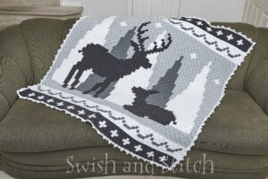 Winter Wonderland C2C Crochet Christmas Afghan on couch