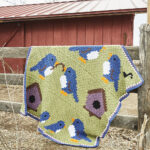Spring Bluebirds afghan by red barn