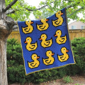 Ducks in a Row C2C Crochet Afghan hanging in tree